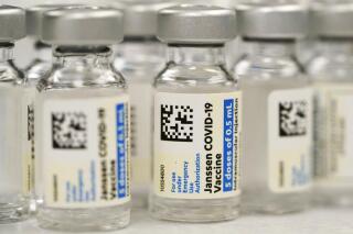 FDA restricts J J s COVID 19 vaccine due to blood clot risk AP News